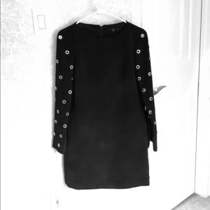 Tibi long sleeved black dress with grommet detail